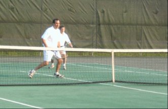 But, it wasn't all work... Me playing tennis with the Oak Ridge Mayor at an annual, city festival.
